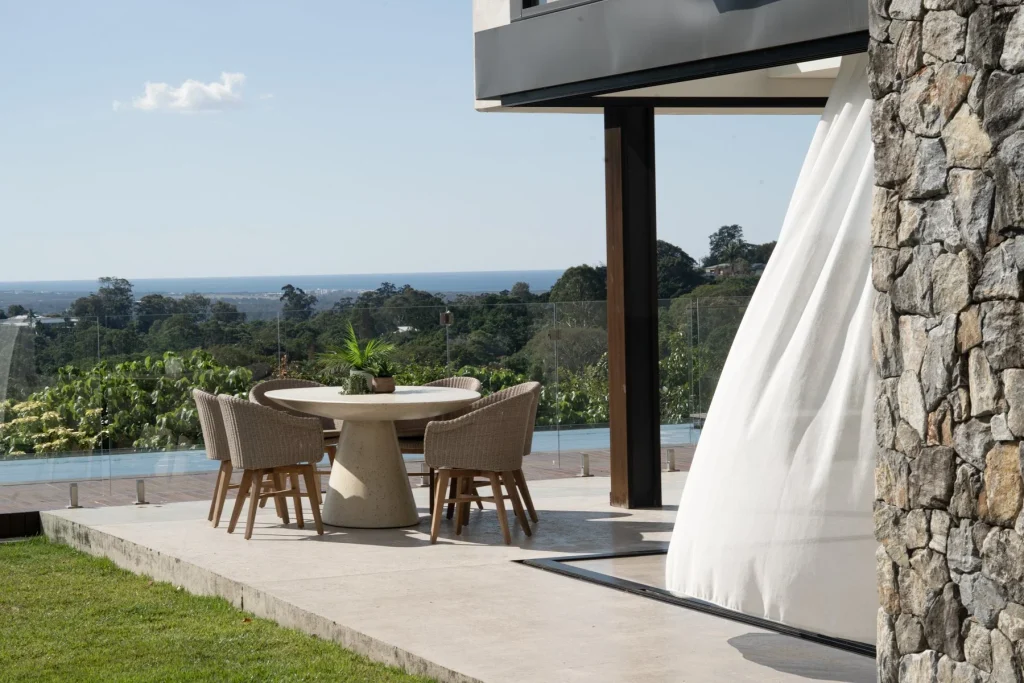 Clara Dining Table with Oceanic Outdoor Arm Chairs