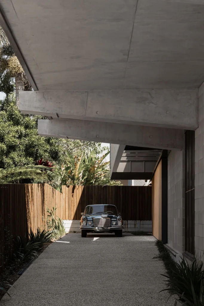 Mercedes sitting under custom home build, suspended slab concrete custom home by Reitsma & Asssociates