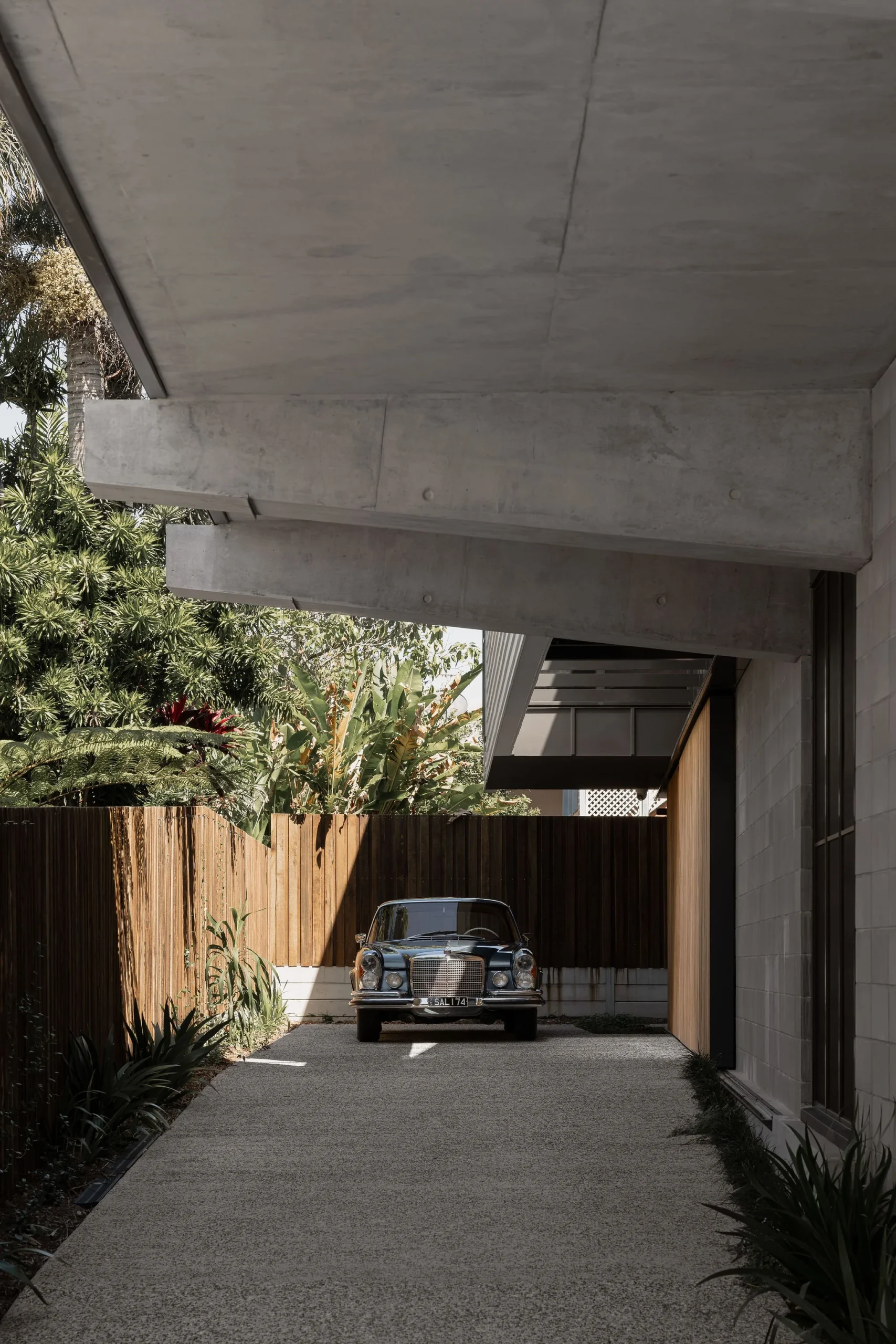Mercedes sitting under custom home build, suspended slab concrete custom home by Reitsma & Asssociates